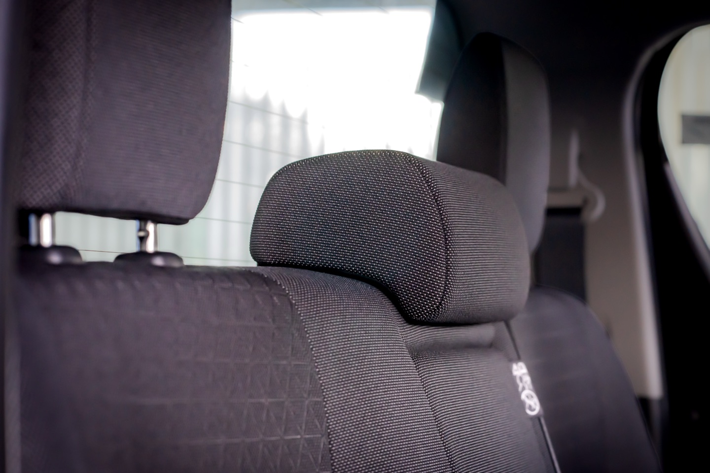 Cloth front seats in the Toyota Hilux E cabin